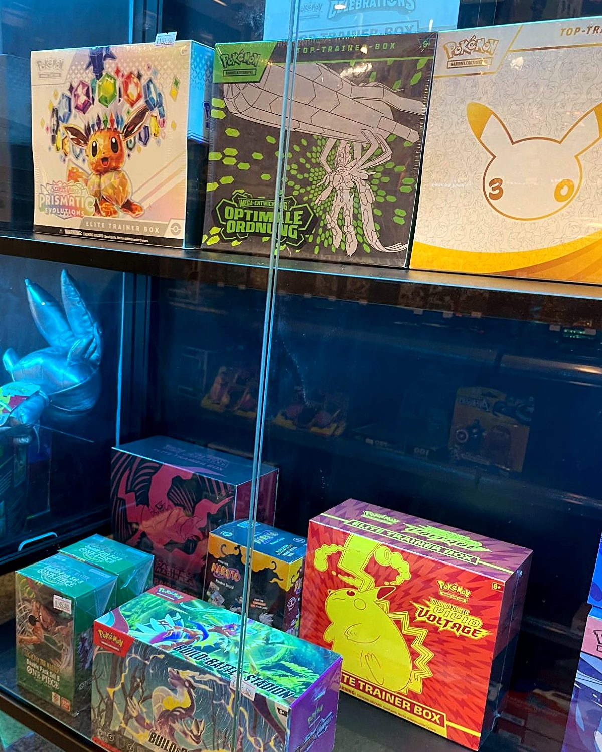 Prismatic Evolutions, Optimale Ordnung und 30-Jahre Top-Trainer-Box